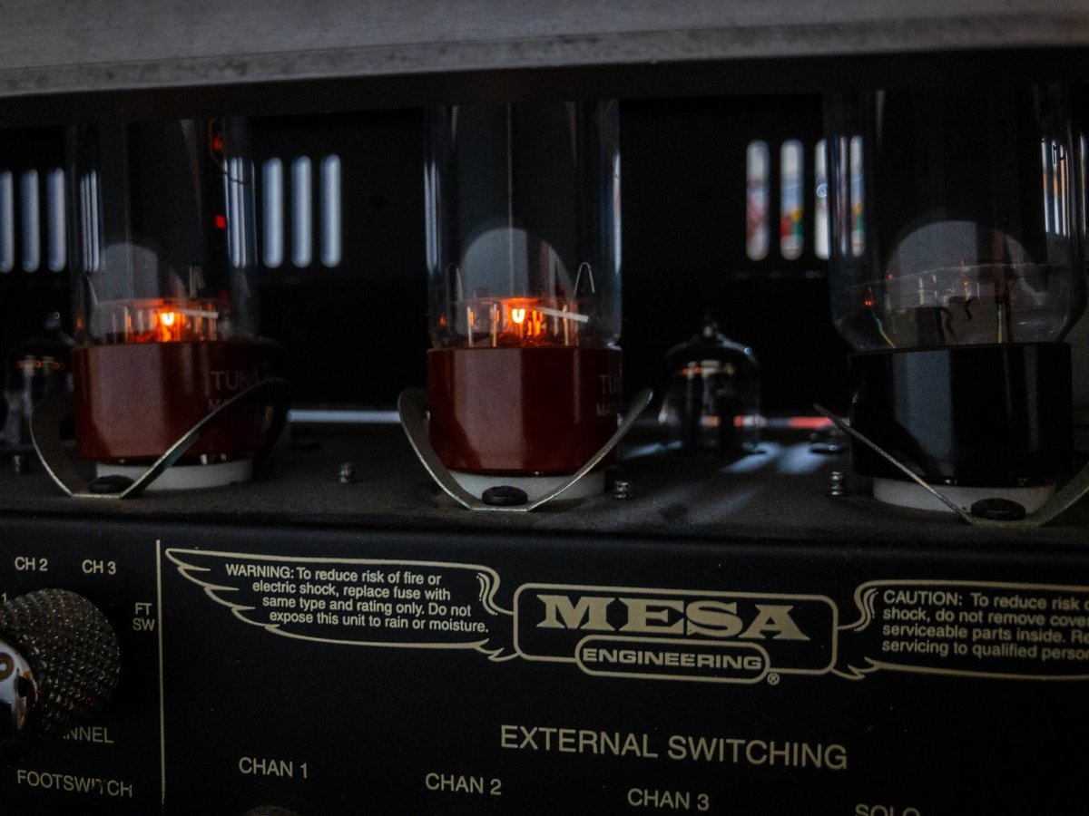 Vacuum tubes sit aglow on a Mesa Boogie Dual Rectifier guitar amplifier